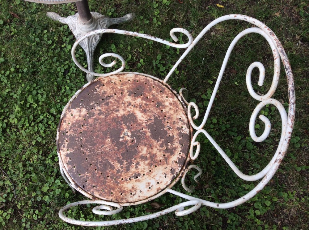 A table together with set of French iron garden chairs  View VII