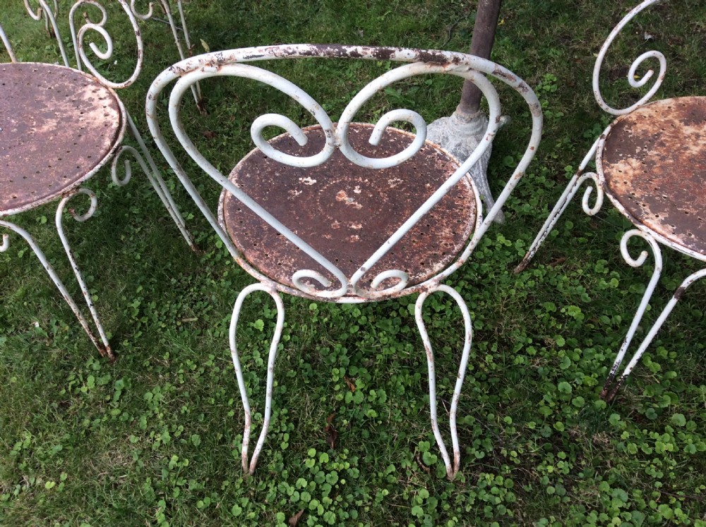 A table together with set of French iron garden chairs  View X