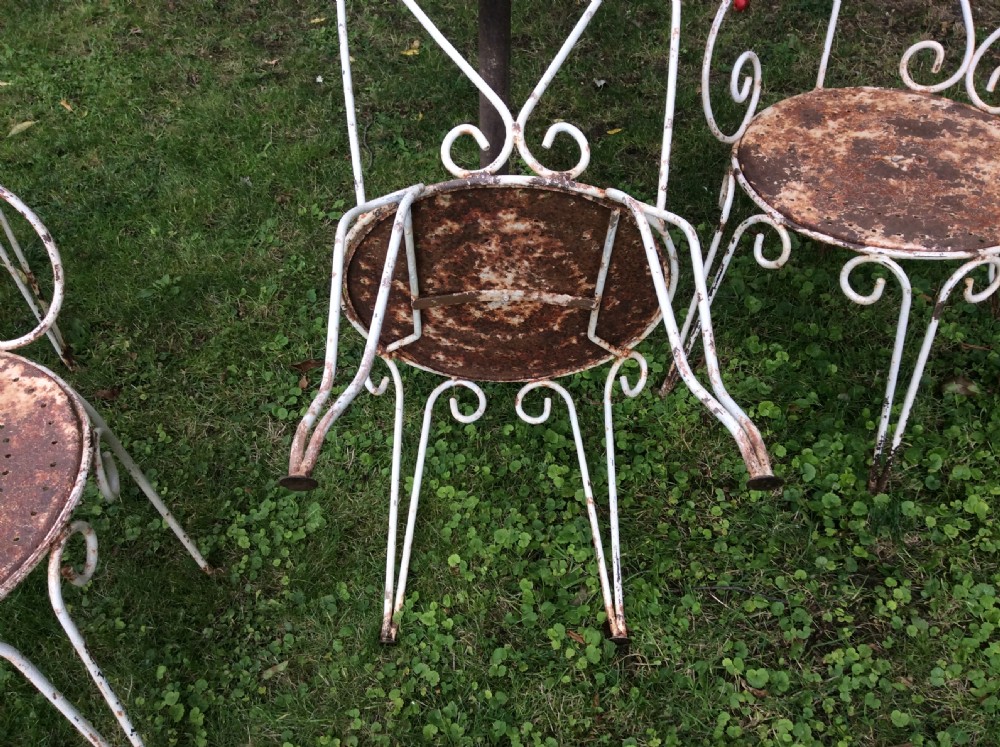 A table together with set of French iron garden chairs  View XII