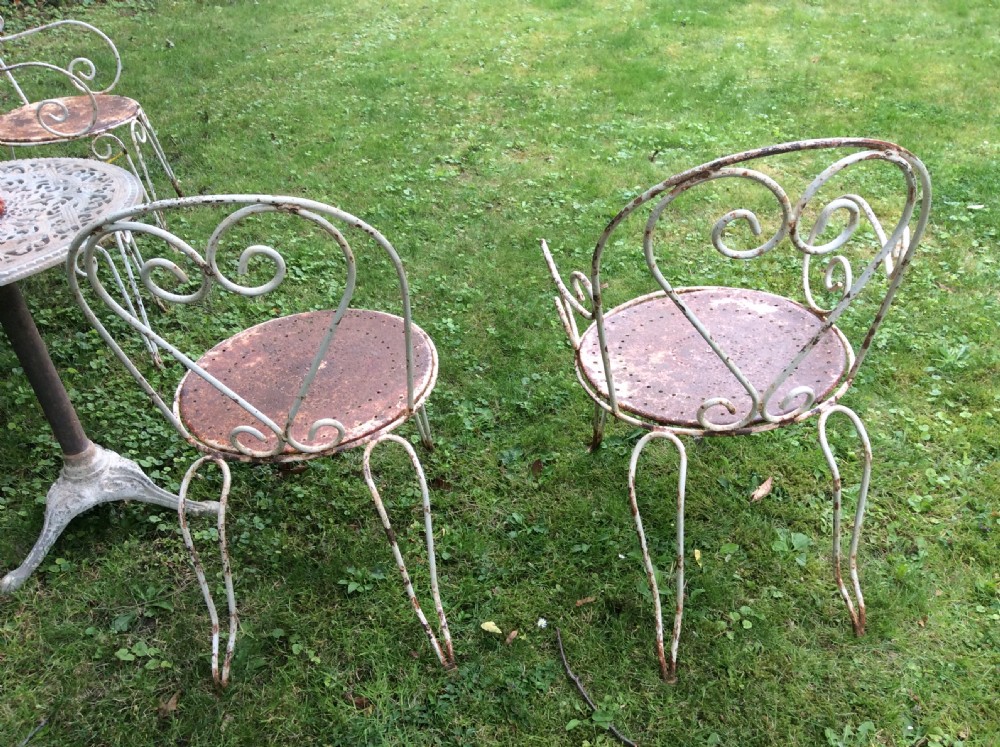 A table together with set of French iron garden chairs  View XIV