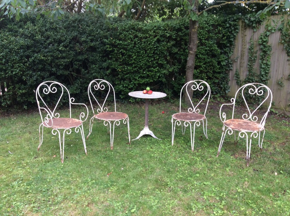 A table together with set of French iron garden chairs  View XV
