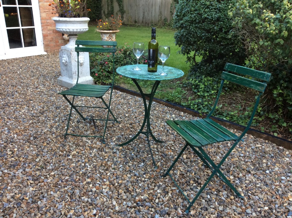 French iron garden table and chairs View III