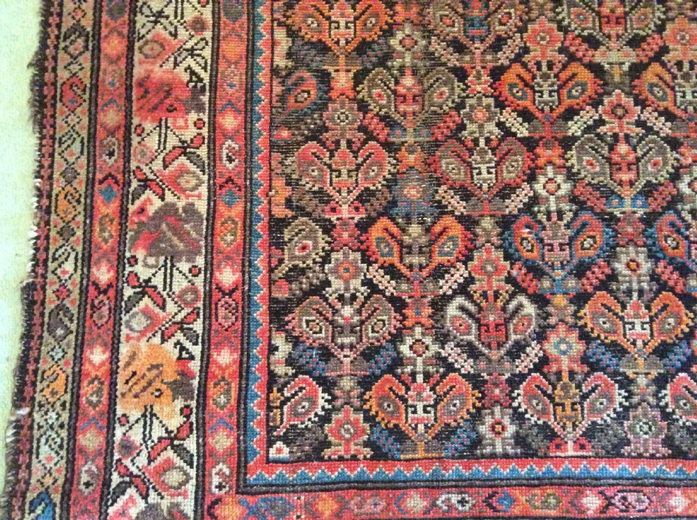 A 19thC Caucasian boteh design rug View II