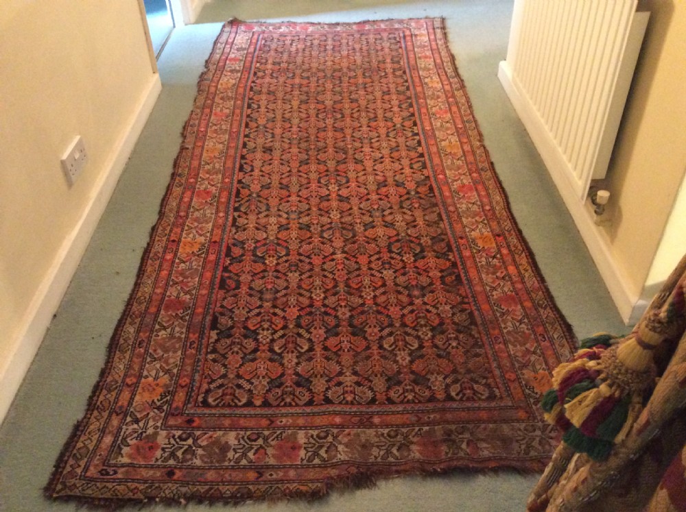 A 19thC Caucasian boteh design rug View III