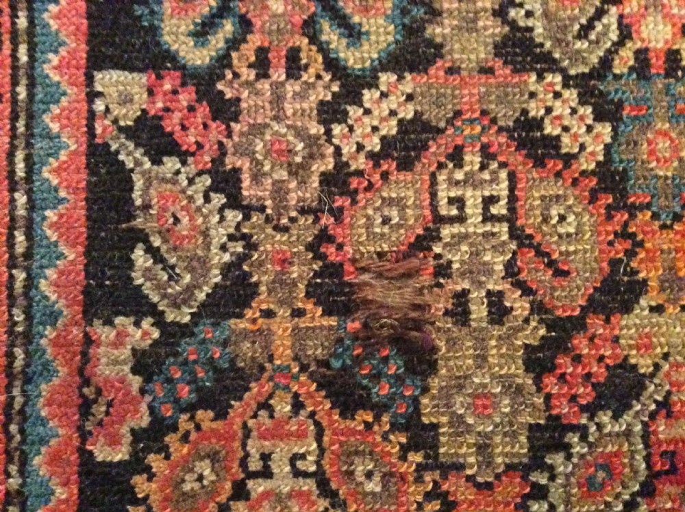 A 19thC Caucasian boteh design rug View IV