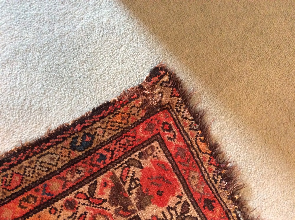 A 19thC Caucasian boteh design rug View VIII