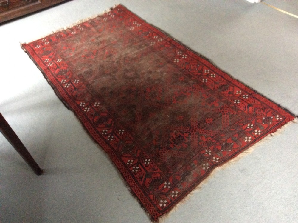 A well worn antique Afgan Baluch rug View V