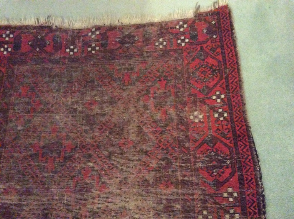 A well worn antique Afgan Baluch rug View XII