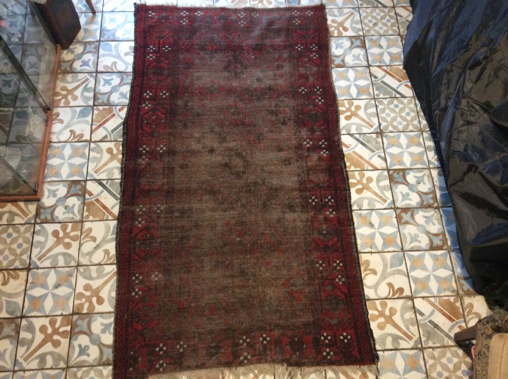 A well worn antique Afgan Baluch rug View XV