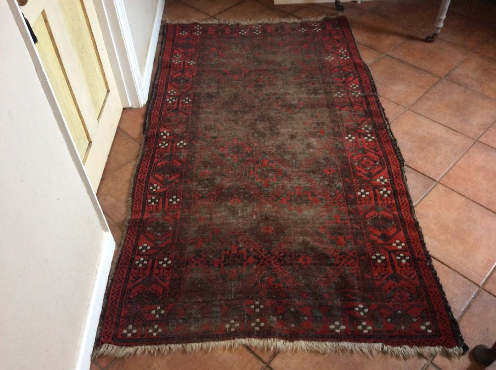 A well worn antique Afgan Baluch rug View XVI