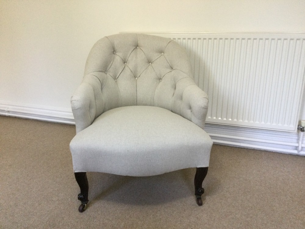 An English button back armchair View II