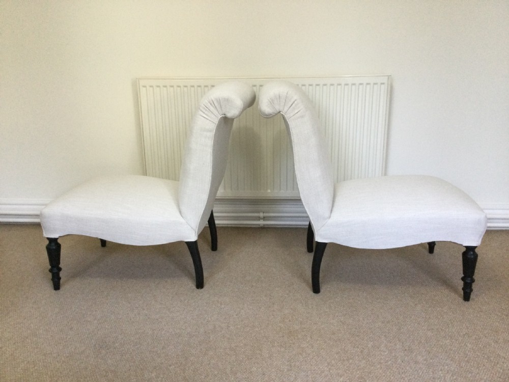A pair of Napoleon III scroll back chairs View II