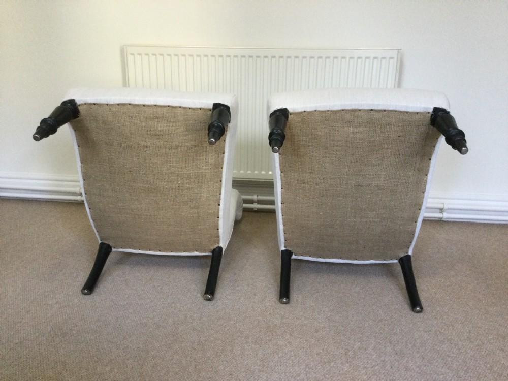 A pair of Napoleon III scroll back chairs View VI