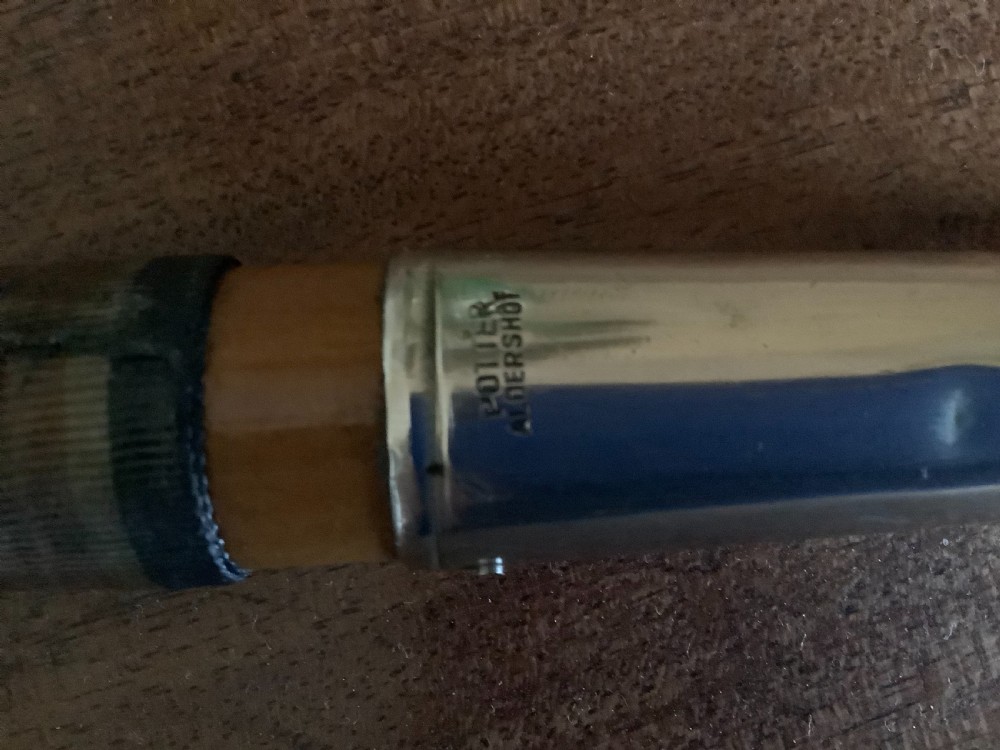 A wooden walking cane featuring a swirl-fluted hallmarked silver pommel top and silver collar. View VIII