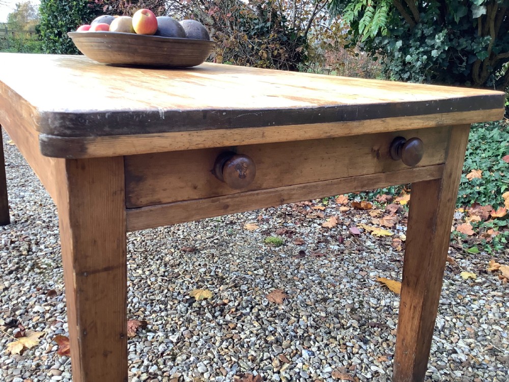 A Victorian pine farmhouse dining table with a rectangular timber top and straight tapered legs. View III
