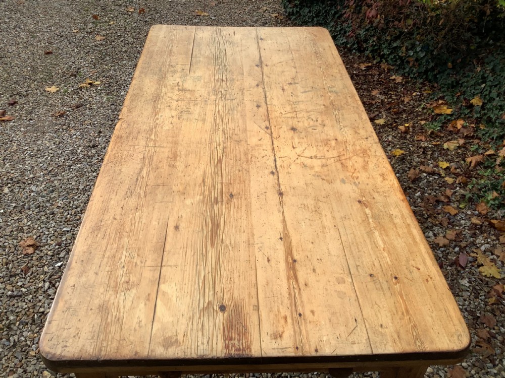 A Victorian pine farmhouse dining table with a rectangular timber top and straight tapered legs. View V