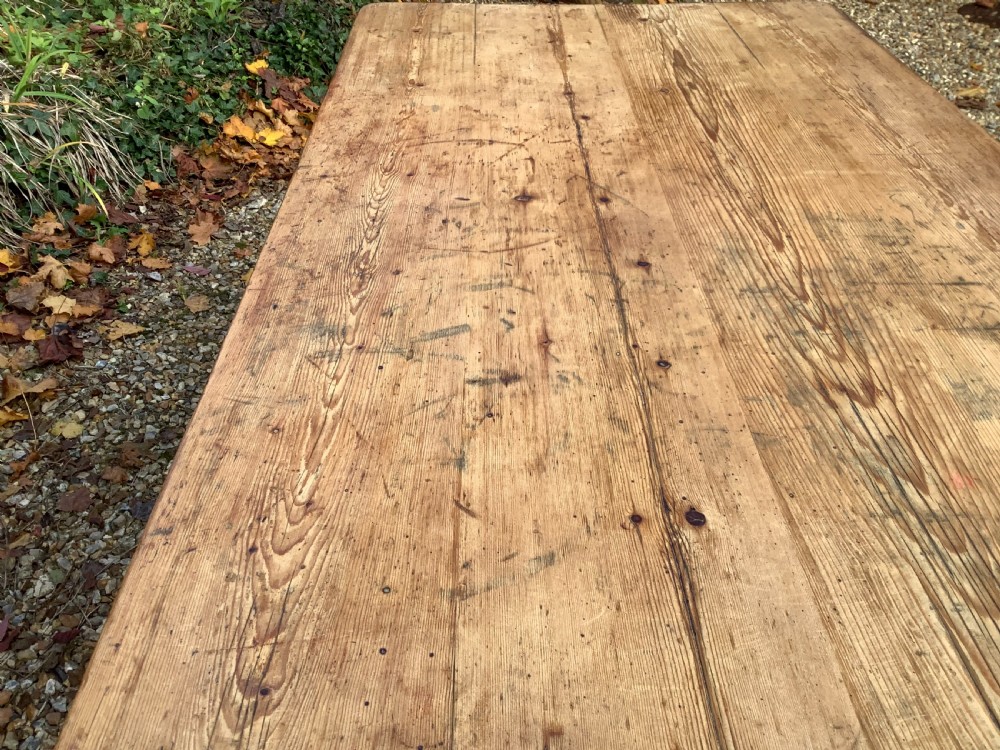 A Victorian pine farmhouse dining table with a rectangular timber top and straight tapered legs. View VII