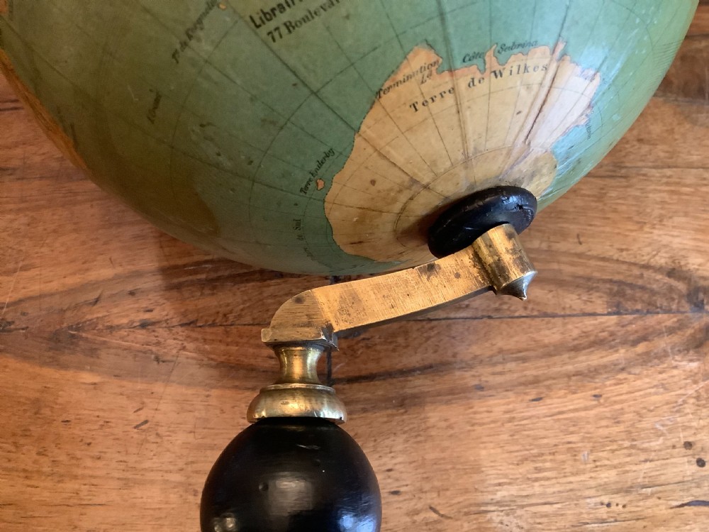 A small 19th-century French terrestrial globe with green oceans, mounted on a turned ebonised wood stand with brass fittings. View IX