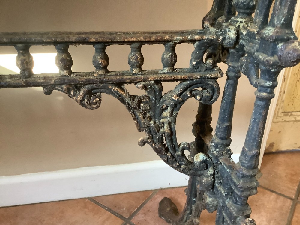 An English marble topped garden console table. View IV