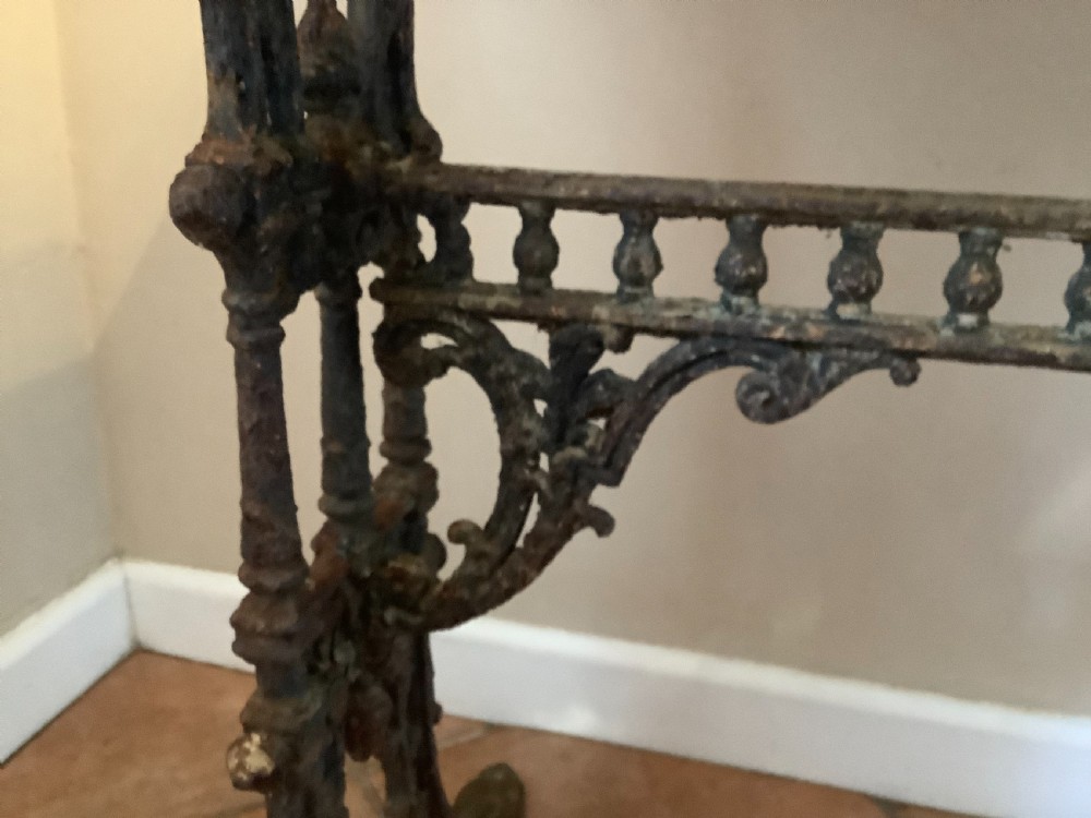 An English marble topped garden console table. View V