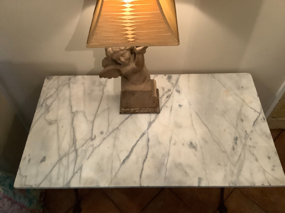 An English marble topped garden console table. View VIII