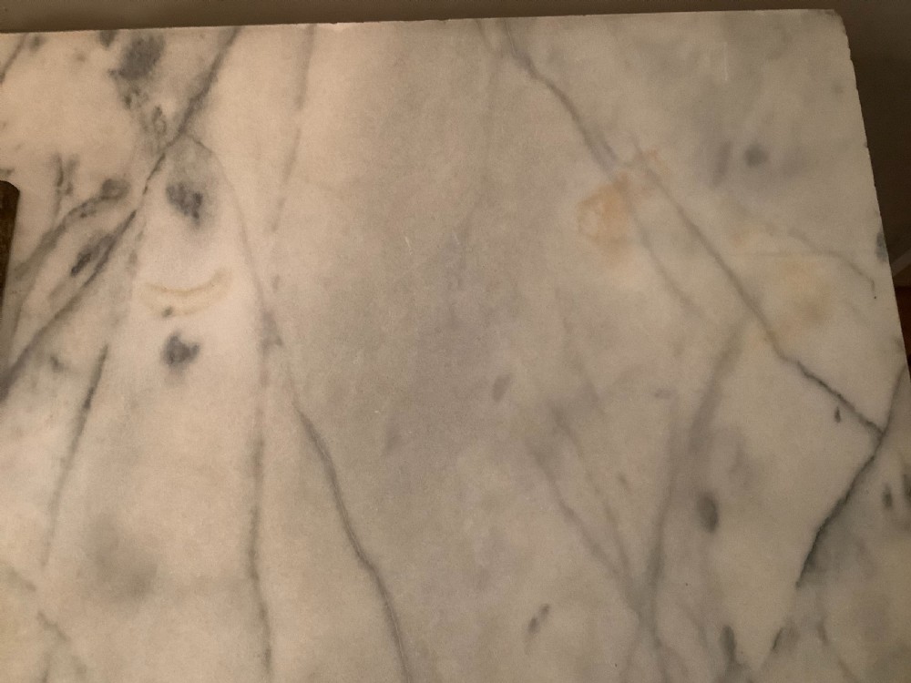 An English marble topped garden console table. View IX