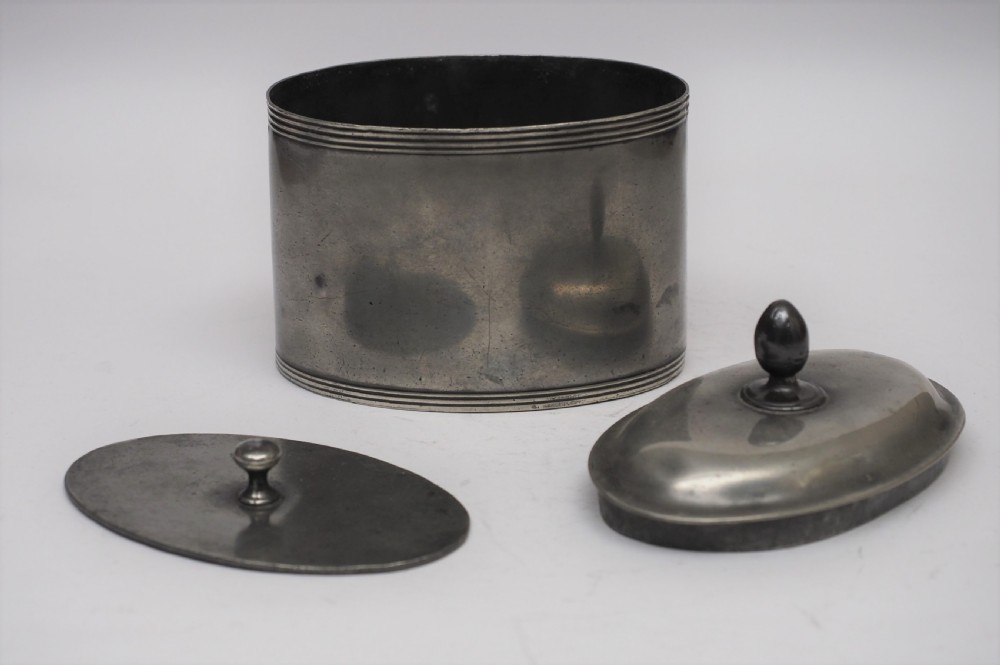 ANTIQUE ENGLISH PEWTER OVAL TOBACCO JAR WITH PRESSER, CIRCA 1780. View V