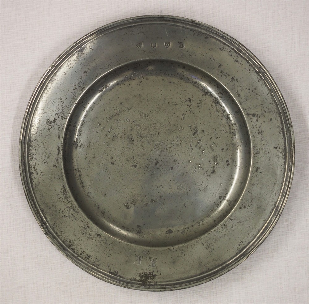 A CHARLES II TRIPLE REEDED PEWTER PLATE BY CHRISTOPHER CLARKE, LONDON CIRCA 1680.