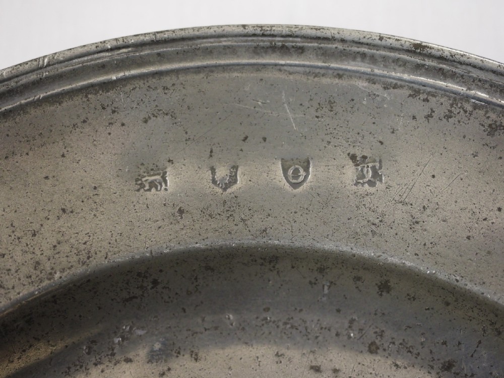 A CHARLES II TRIPLE REEDED PEWTER PLATE BY CHRISTOPHER CLARKE, LONDON CIRCA 1680. View III