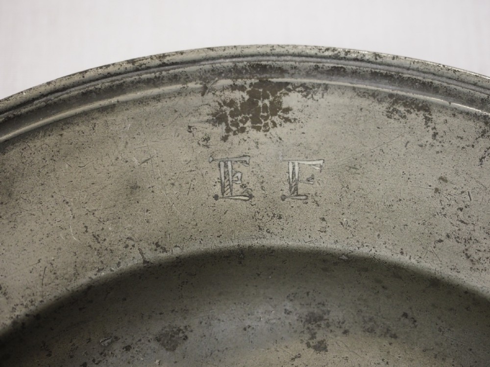 A CHARLES II TRIPLE REEDED PEWTER PLATE BY CHRISTOPHER CLARKE, LONDON CIRCA 1680. View IV