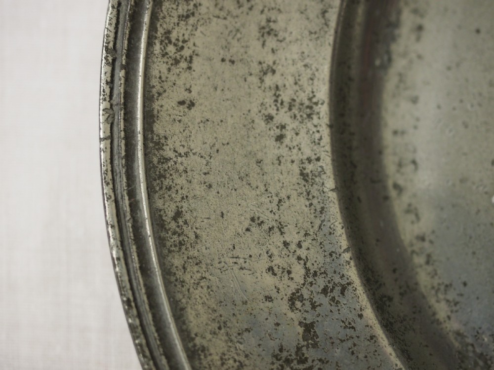 A CHARLES II TRIPLE REEDED PEWTER PLATE BY CHRISTOPHER CLARKE, LONDON CIRCA 1680. View V