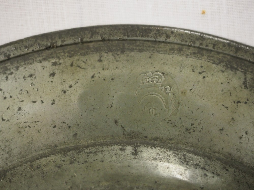 A CHARLES II TRIPLE REEDED PEWTER PLATE BY CHRISTOPHER CLARKE, LONDON CIRCA 1680. View IX
