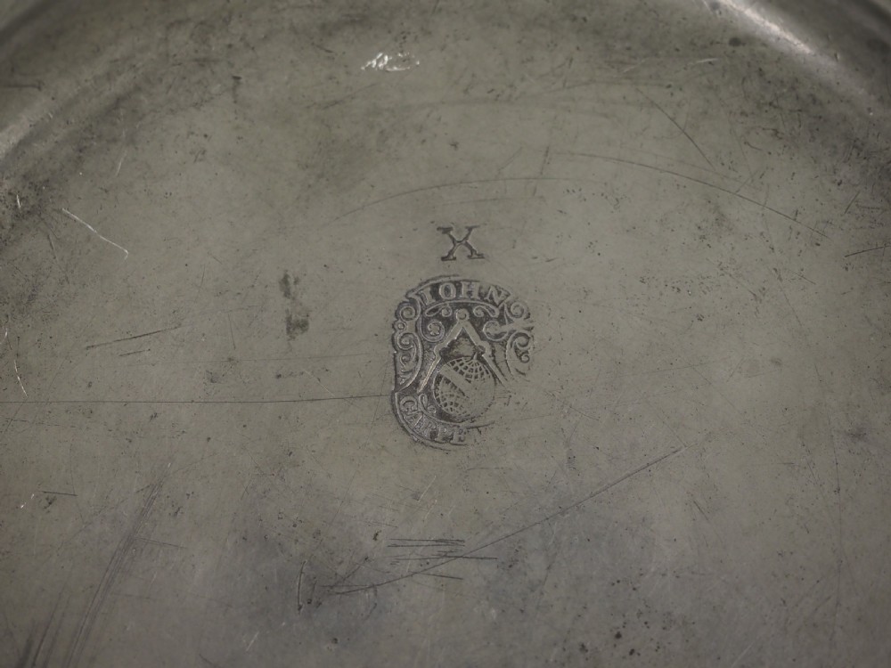 GEORGE II PEWTER PLATE WITH GADROONED EDGE BY JOHN CARPENTER, LONDON CIRCA 1740. View V
