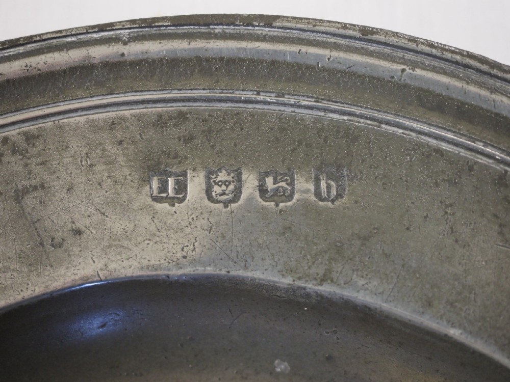 QUEEN ANNE PEWTER TRIPLE REEDED SEMI-BROAD RIM PLATE BY EDMUND EMBRIS, CIRCA 1710. View X