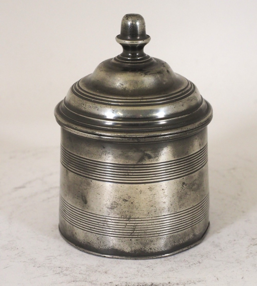 ANTIQUE ENGLISH PEWTER TOBACCO JAR WITH PRESSER, ACORN FINIAL, CIRCA 1830.