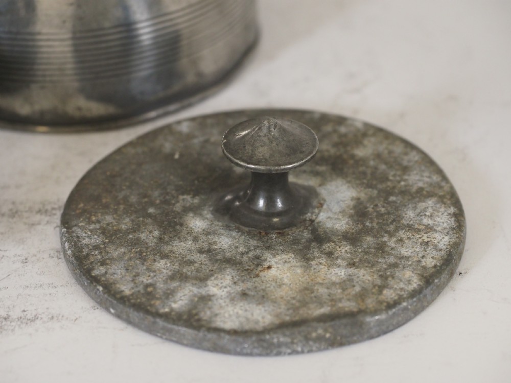 ANTIQUE ENGLISH PEWTER TOBACCO JAR WITH PRESSER, ACORN FINIAL, CIRCA 1830. View V