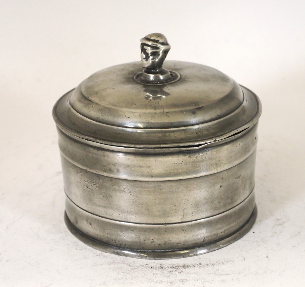 ANTIQUE ENGLISH PEWTER TOBACCO JAR WITH MANS HEAD, ORIGINAL PRESSER, CIRCA 1830.