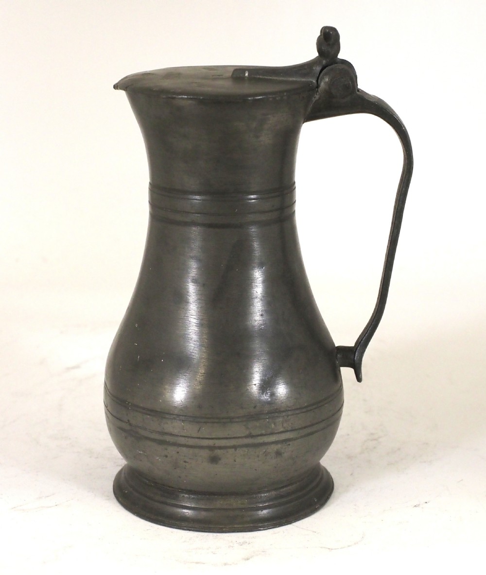 ANTIQUE GUERNSEY PEWTER 1 PINT LIDDED FLAGON BY CARTER, CIRCA 1750.