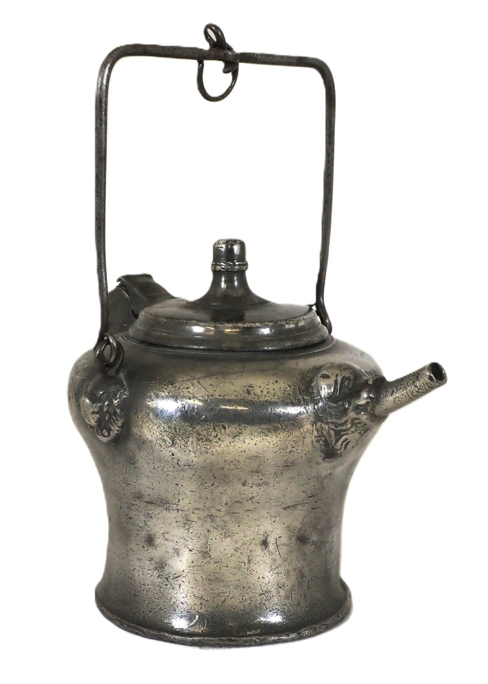 An antique 18th-century Swiss pewter biberon water vessel featuring a flared base, side spout with relief detailing, fitted lid, and tall wire handle.