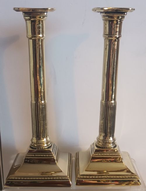 PAIR OF ANTIQUE ENGLISH GEORGIAN BRASS CANDLESTICKS - ADDITIONAL PHOTO 1