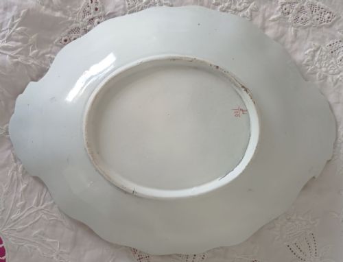fig 1. An oval English Georgian ironstone china low comport featuring a scalloped rim, integrated handles, and hand-painted Japan pattern florals in cobalt blue, rust red, and gilt accents.