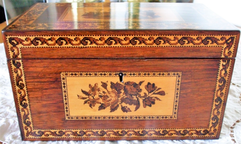 A rectangular Victorian rosewood tea caddy featuring intricate Tunbridge ware mosaic borders and a central pictorial inlay on the hinged lid. View III