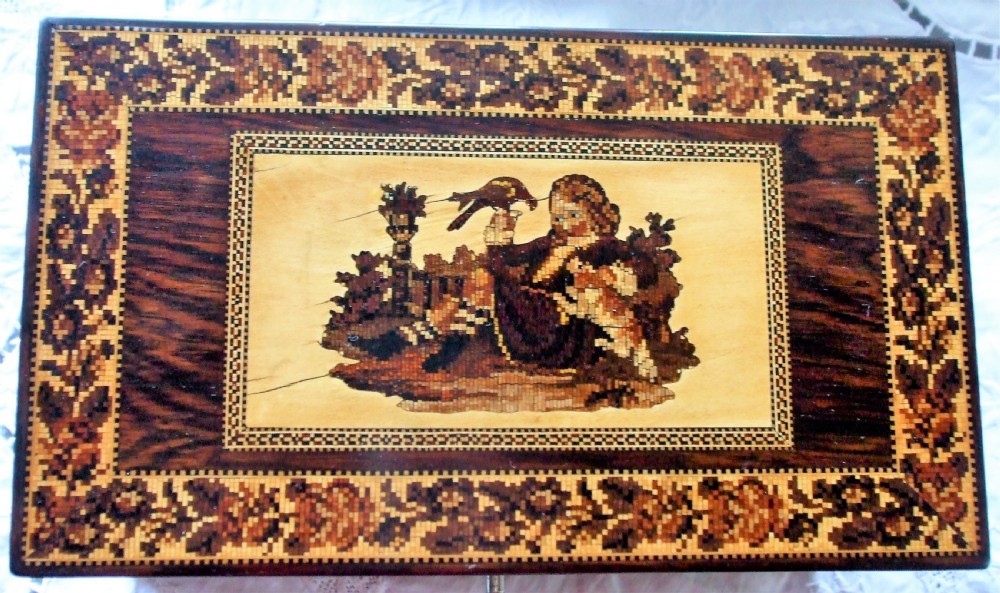 A rectangular Victorian rosewood tea caddy featuring intricate Tunbridge ware mosaic borders and a central pictorial inlay on the hinged lid. View IV