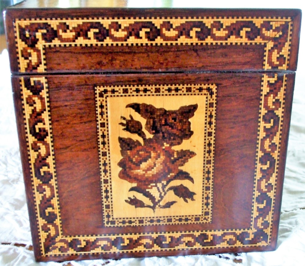 A rectangular Victorian rosewood tea caddy featuring intricate Tunbridge ware mosaic borders and a central pictorial inlay on the hinged lid. View VI