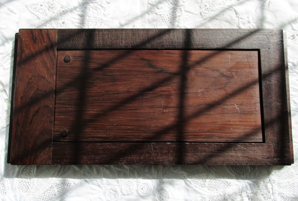 An antique Victorian expanding rosewood book slide decorated with Tunbridge ware marquetry panels depicting a scroll pattern and a moth. View IV