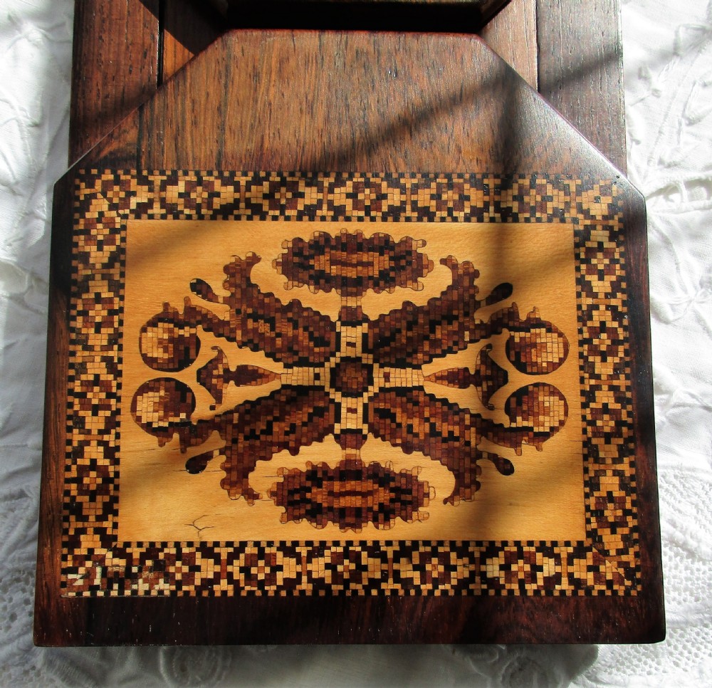 An antique Victorian expanding rosewood book slide decorated with Tunbridge ware marquetry panels depicting a scroll pattern and a moth. View V
