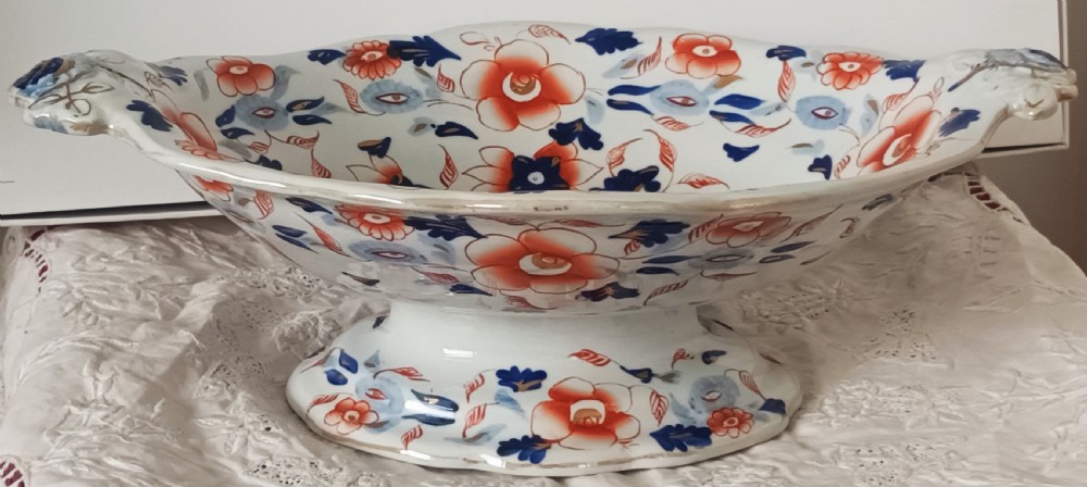 An antique Georgian ironstone footed comport featuring a hand-painted Japan pattern in cobalt blue and rust orange with twin side handles. View II