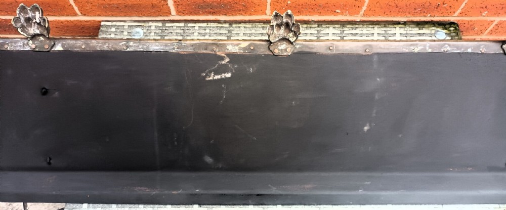 A Victorian pierced brass fireplace fender with central rope-twist moulding, pierced fretwork bands, and cast paw feet. View XII