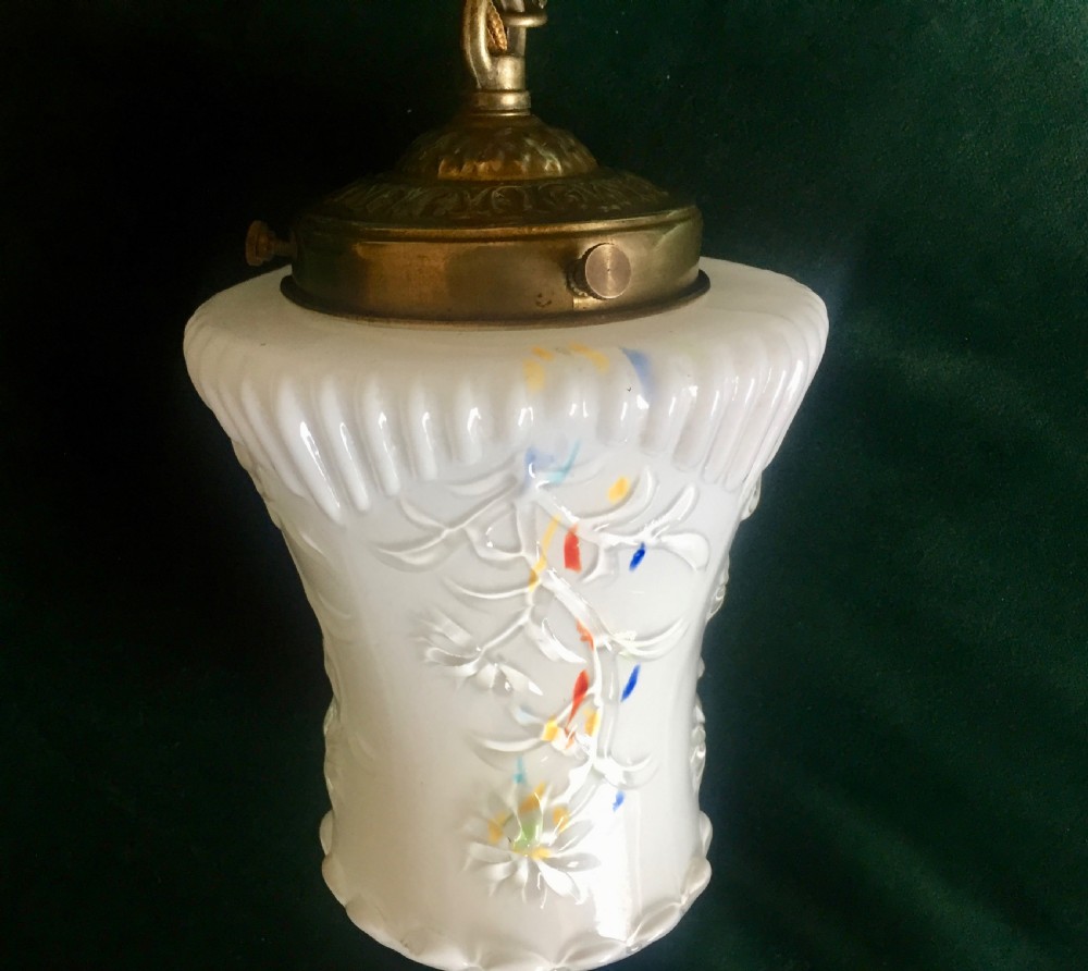 An Edwardian white opaline glass ceiling lamp shade with moulded relief patterns, multicoloured enamel flecks, and a brass top gallery. View III