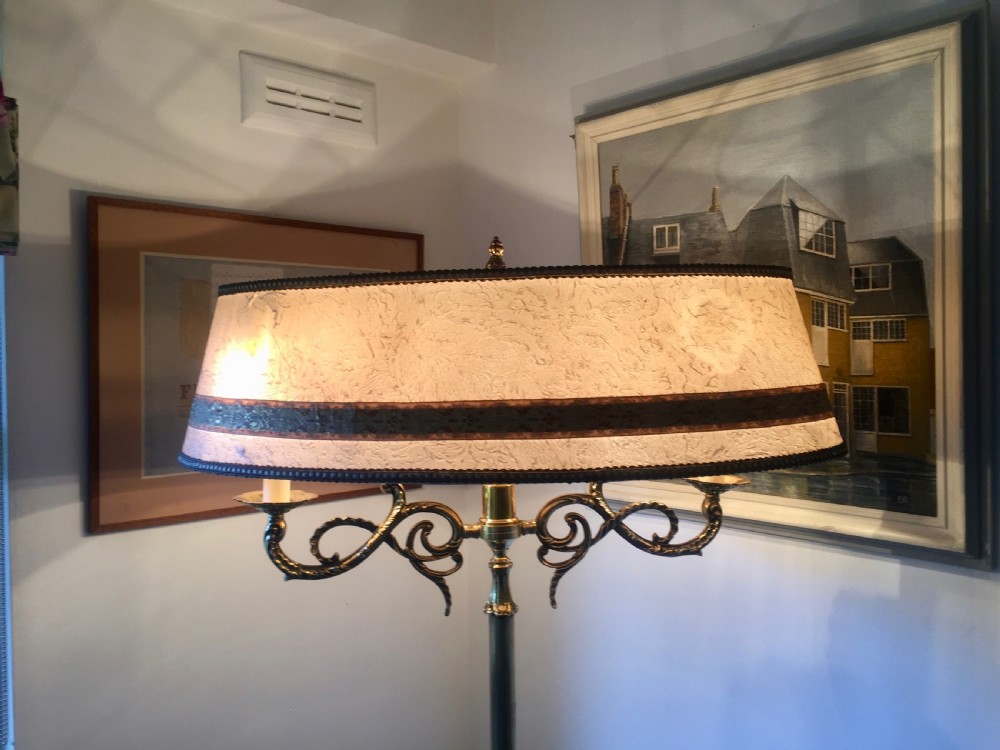 A tall Belle Epoque bronze standard lamp featuring scrollwork branches, a reeded central column, a tripod base, and an oval fabric shade. View V